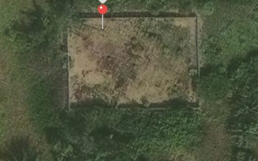 En vente terrain 633m2 Acd sur terre ferme bordure lac brakré à la baie des milliardaires